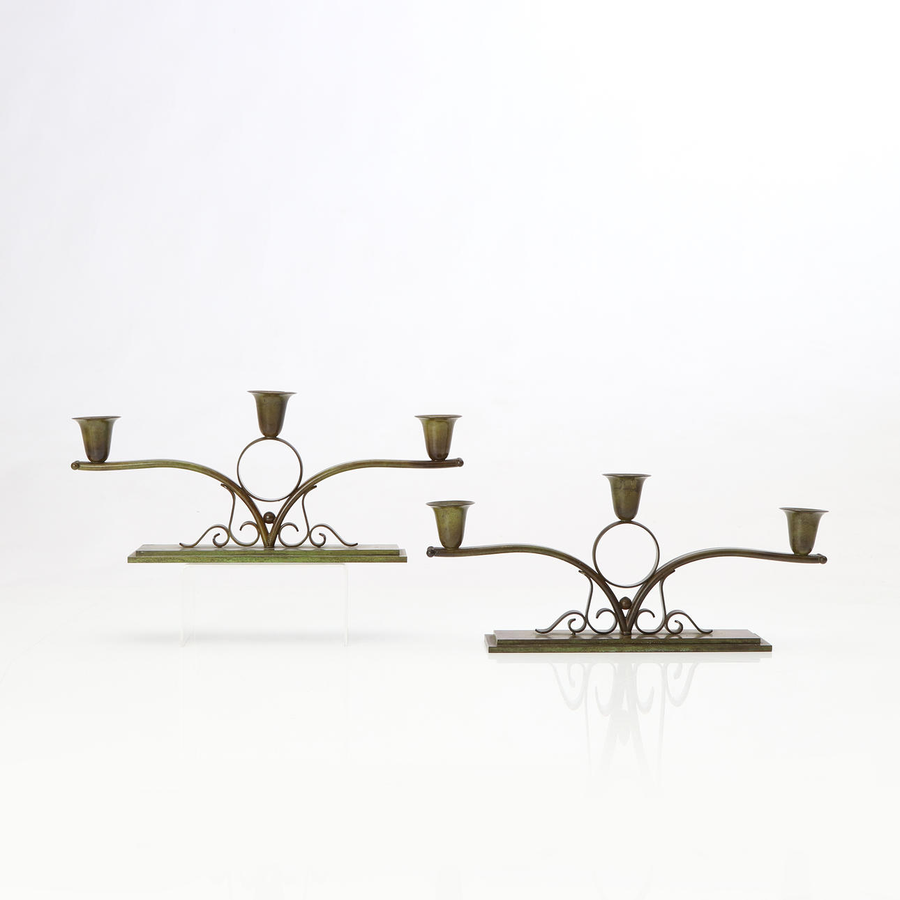 CANDLESTICKS, A PAIR. Patinated bronze. Denmark, 1920s/30s.