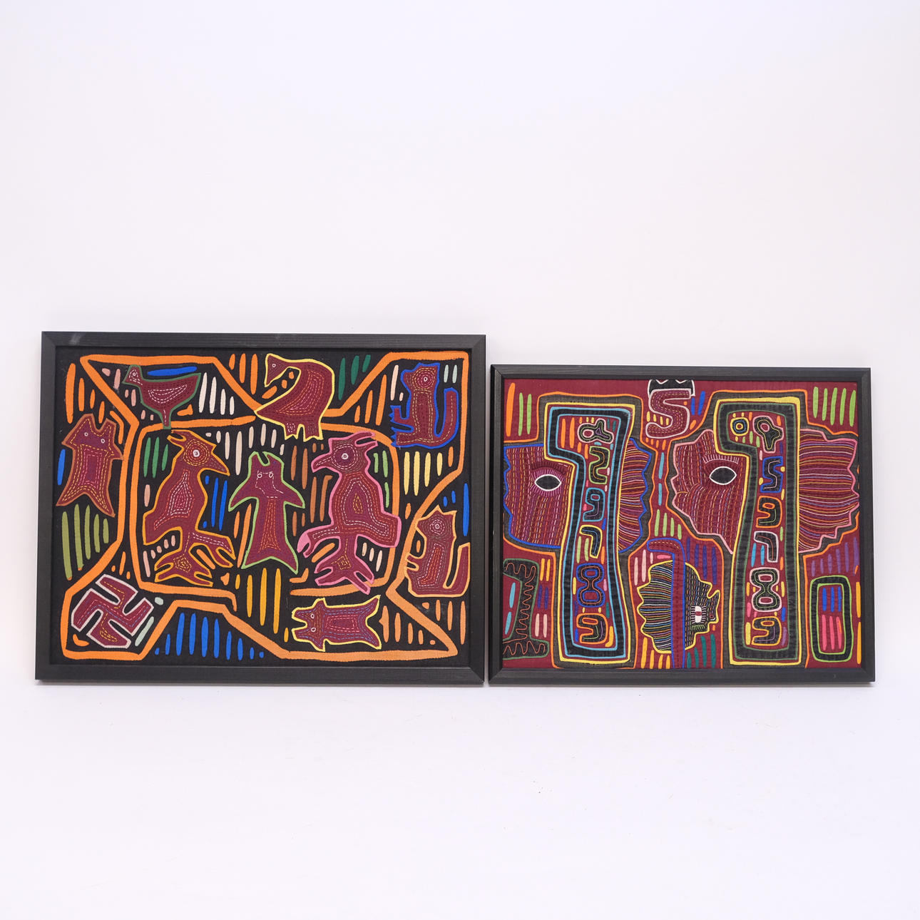 TWO TEXTILE PANELS, MOLA.