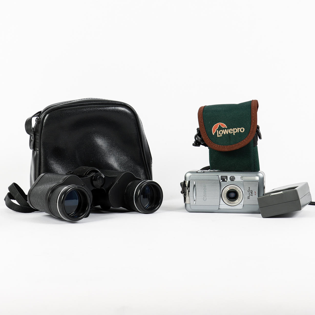 DIGITAL CAMERA AND BINOCULARS.