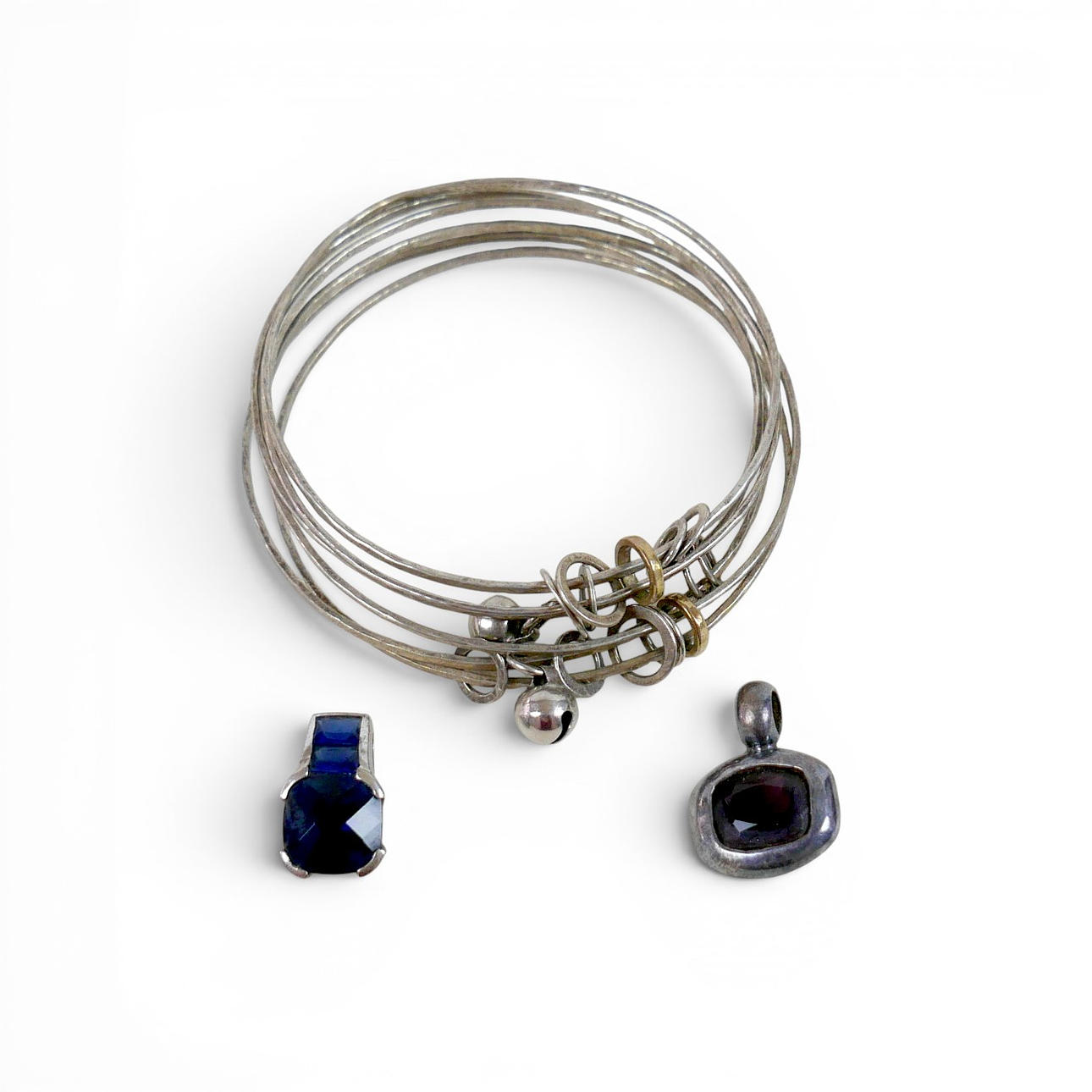 TWO 925 SILVER PENDANTS SET WITH HARDSTONES.