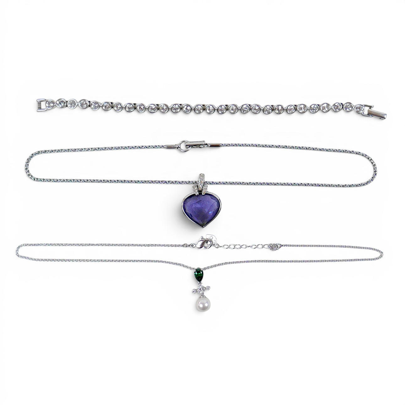 THREE SWAROVSKI PIECES.