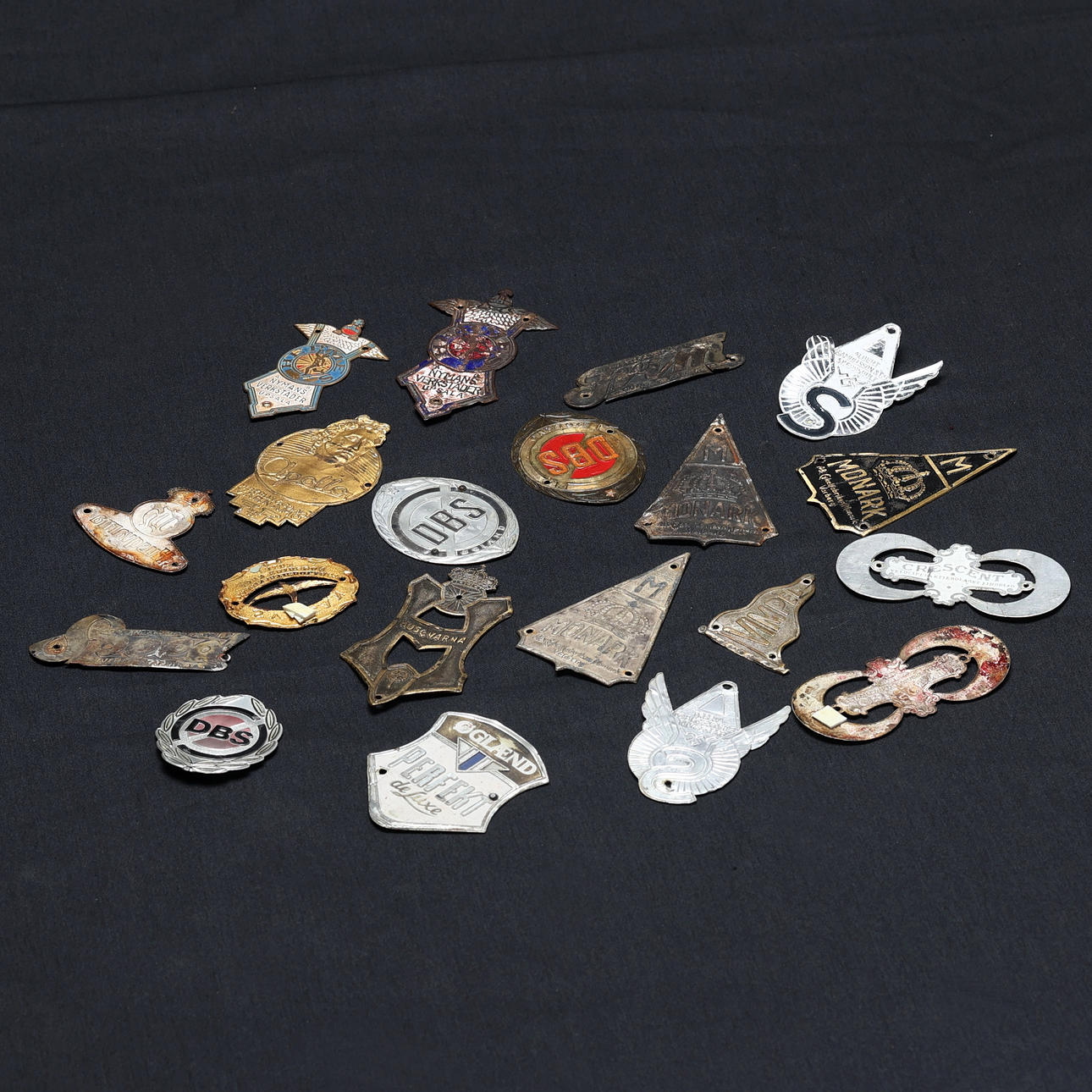 COLLECTION OF BICYCLE BADGES.