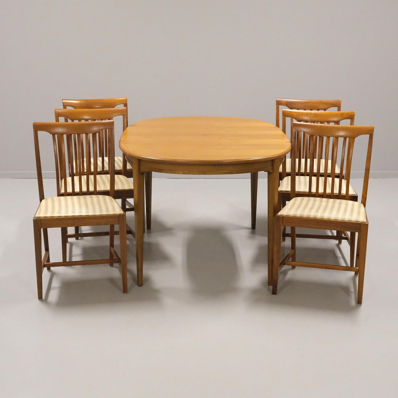 SVANTE SKOGH. DINING SUITE, "VINDÖ", WALNUT, 9 PIECES.