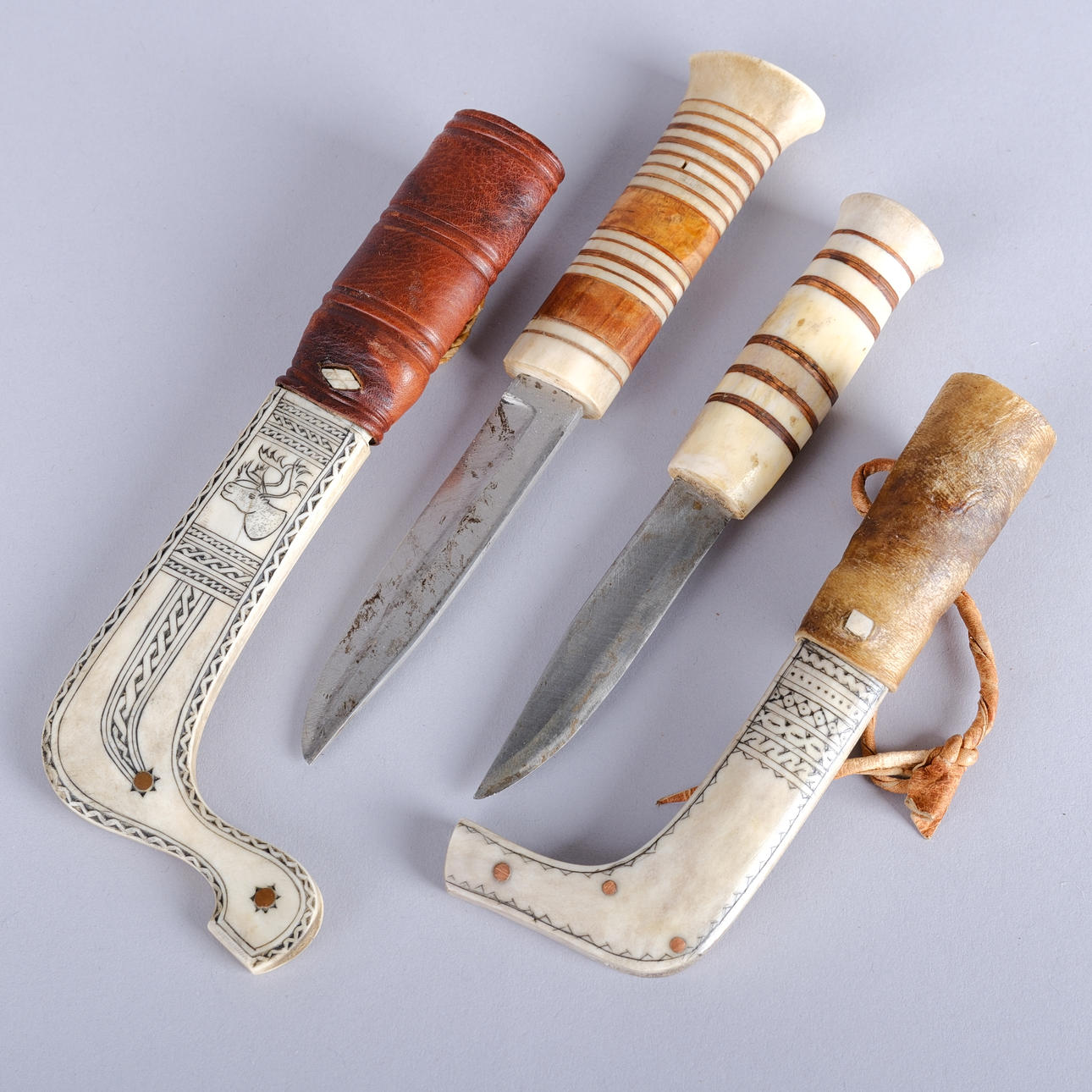 HALF-HORN KNIVES, signed, 20th century (2 pcs).