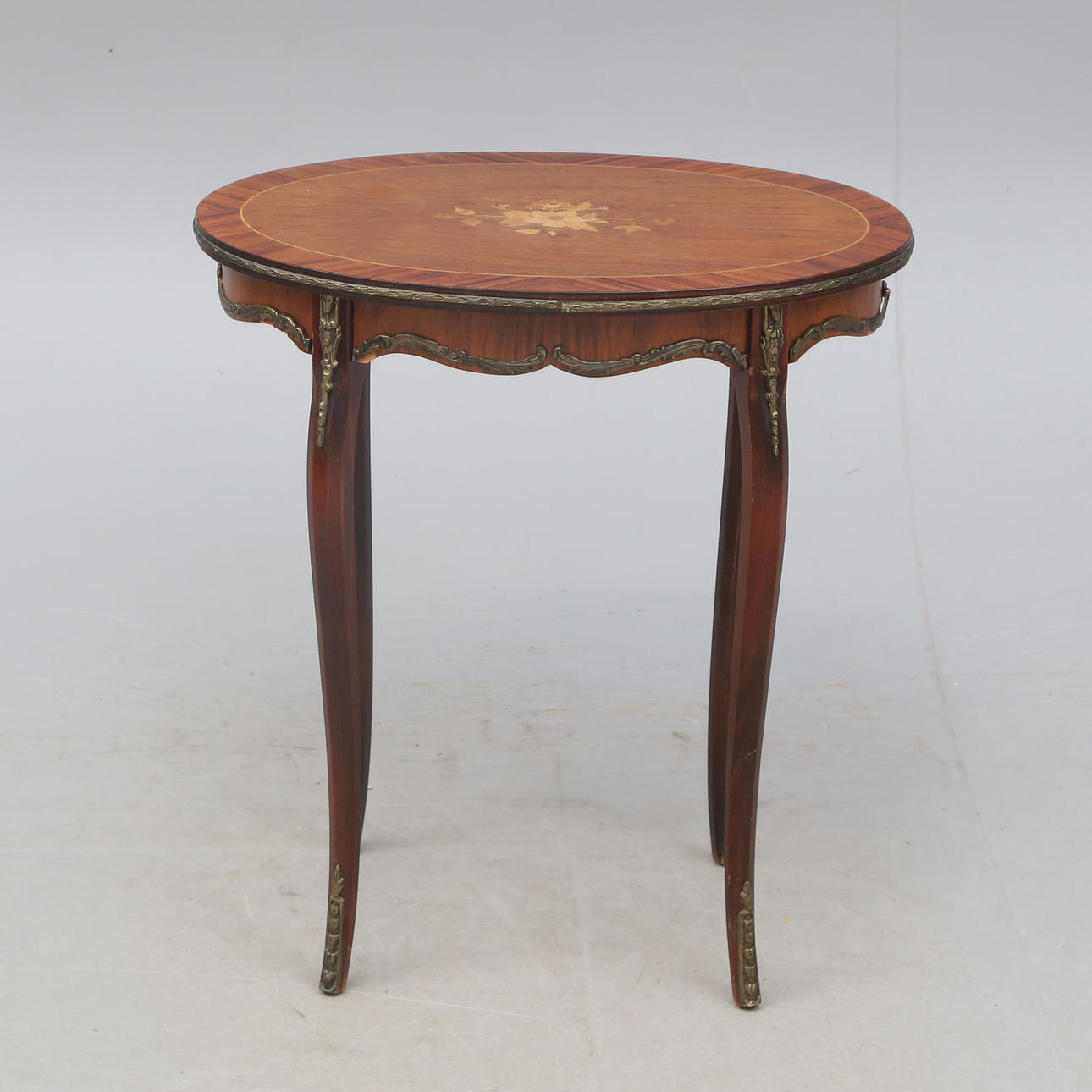 SMALL TABLE, with marquetry and metal edge.