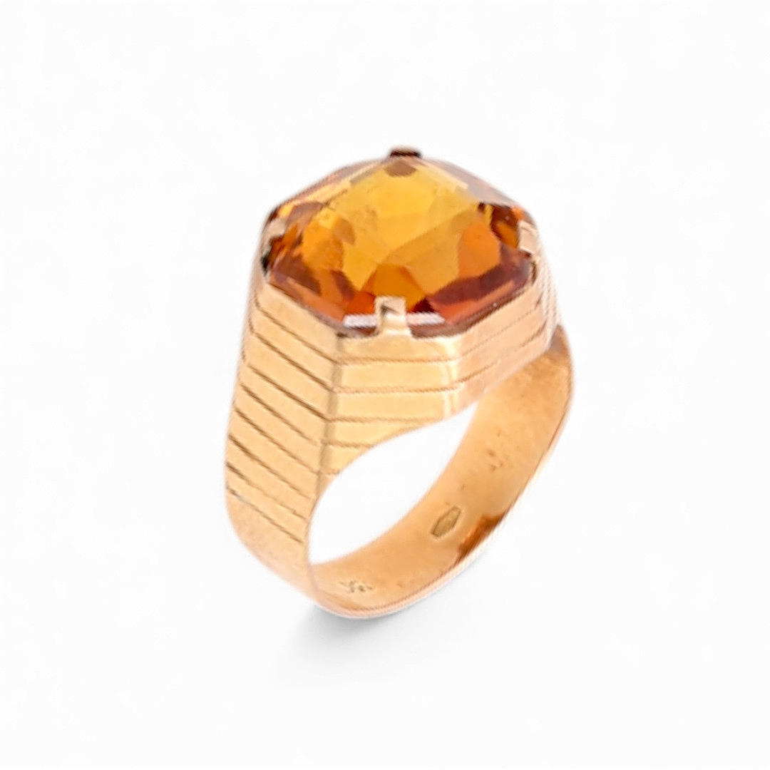 Gold and gemstones signet ring.