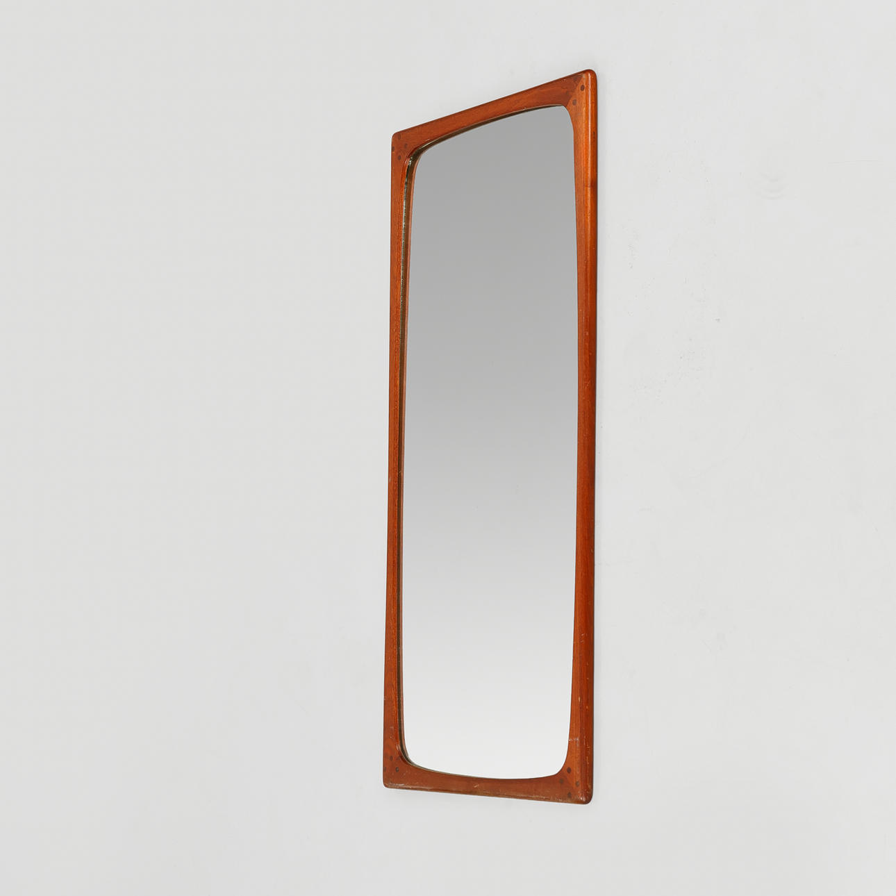 WALL mirror with solid teak frame and circular joints in the corners, Denmark, 1950s/60s.