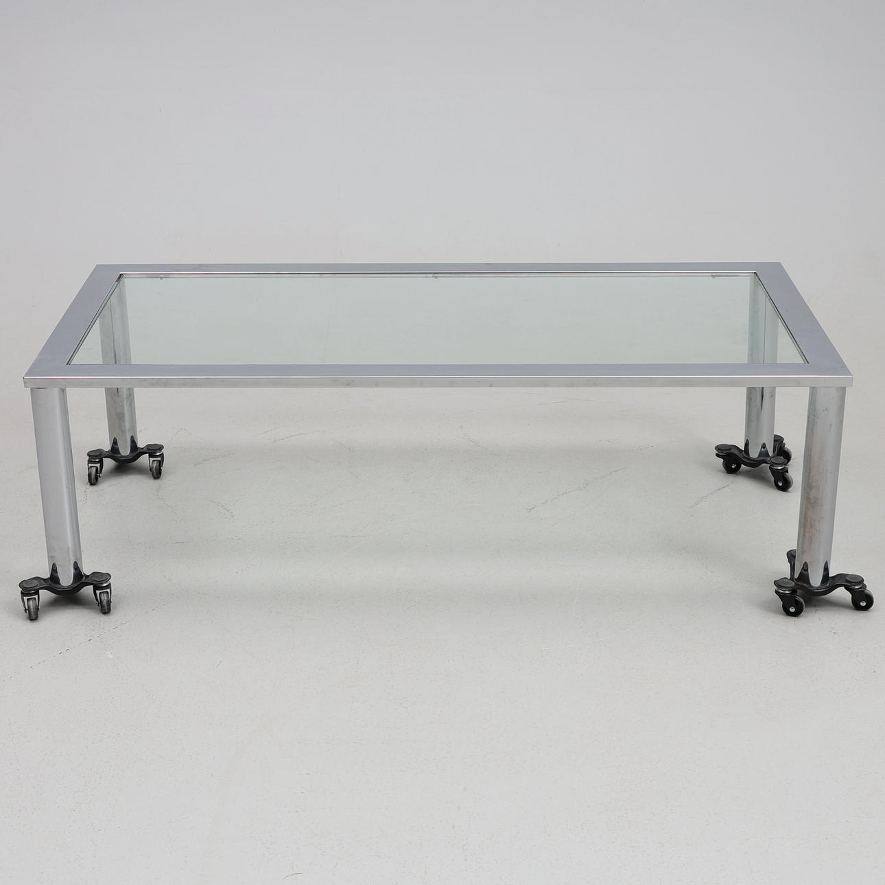 COFFEE TABLE. Steel with glass top.