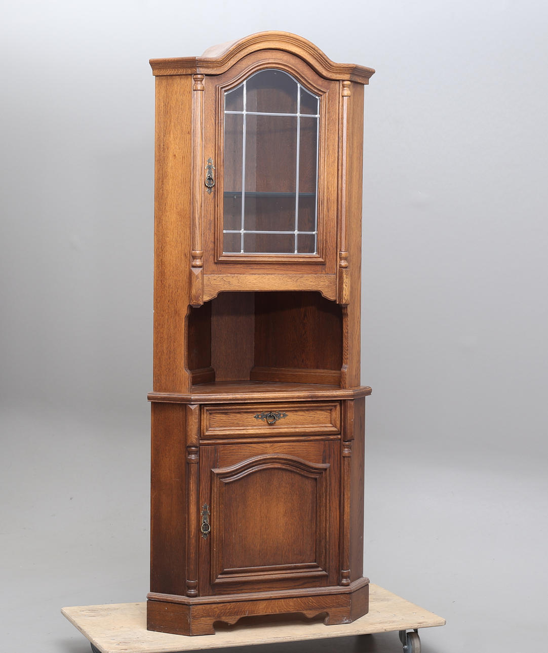 CORNER CABINET, stained oak, late 20th century.