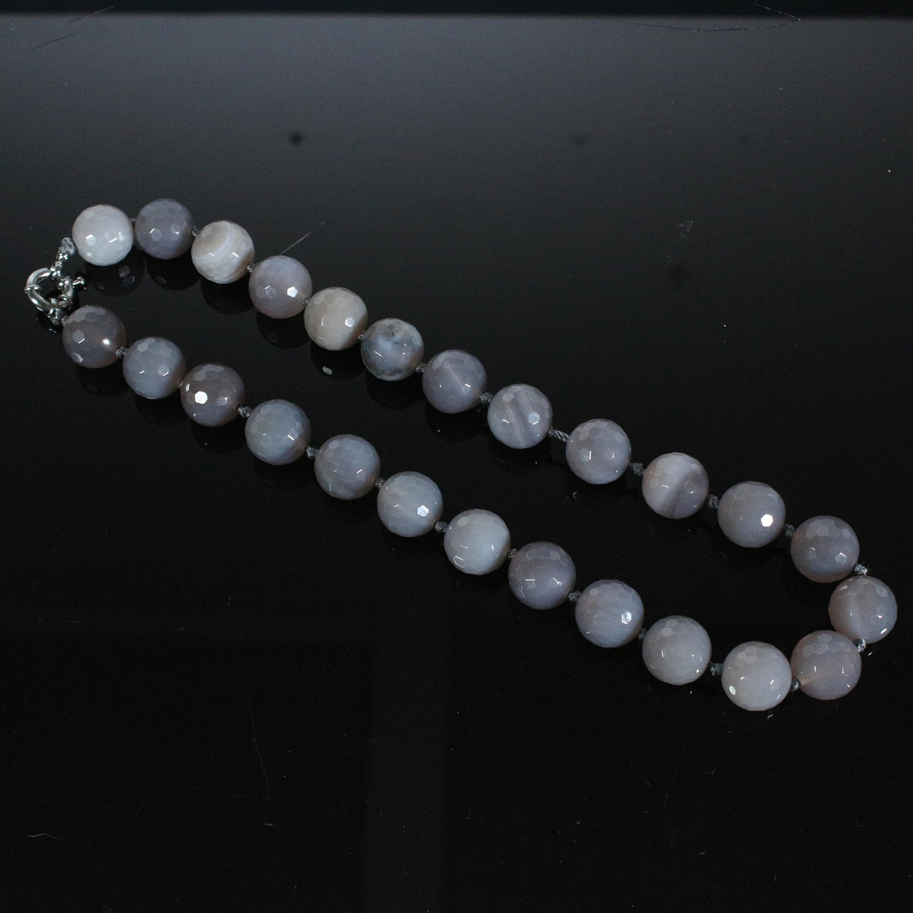 Necklace with faceted enhydro agate.