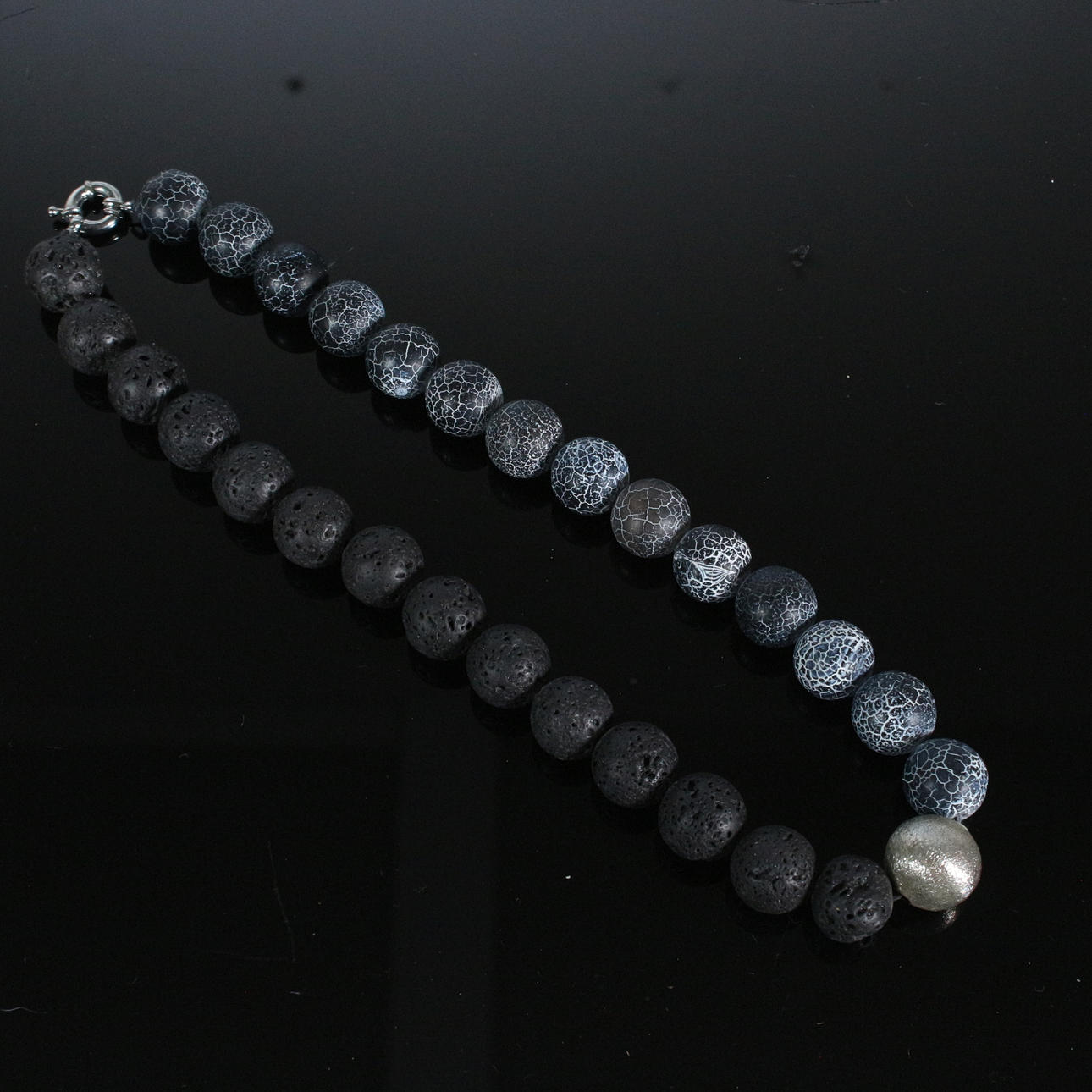 Necklace with agate and lava stone beads.