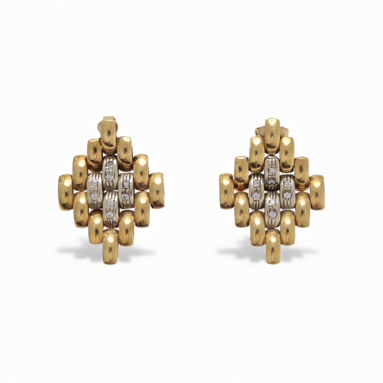 Two-tone gold earrings.