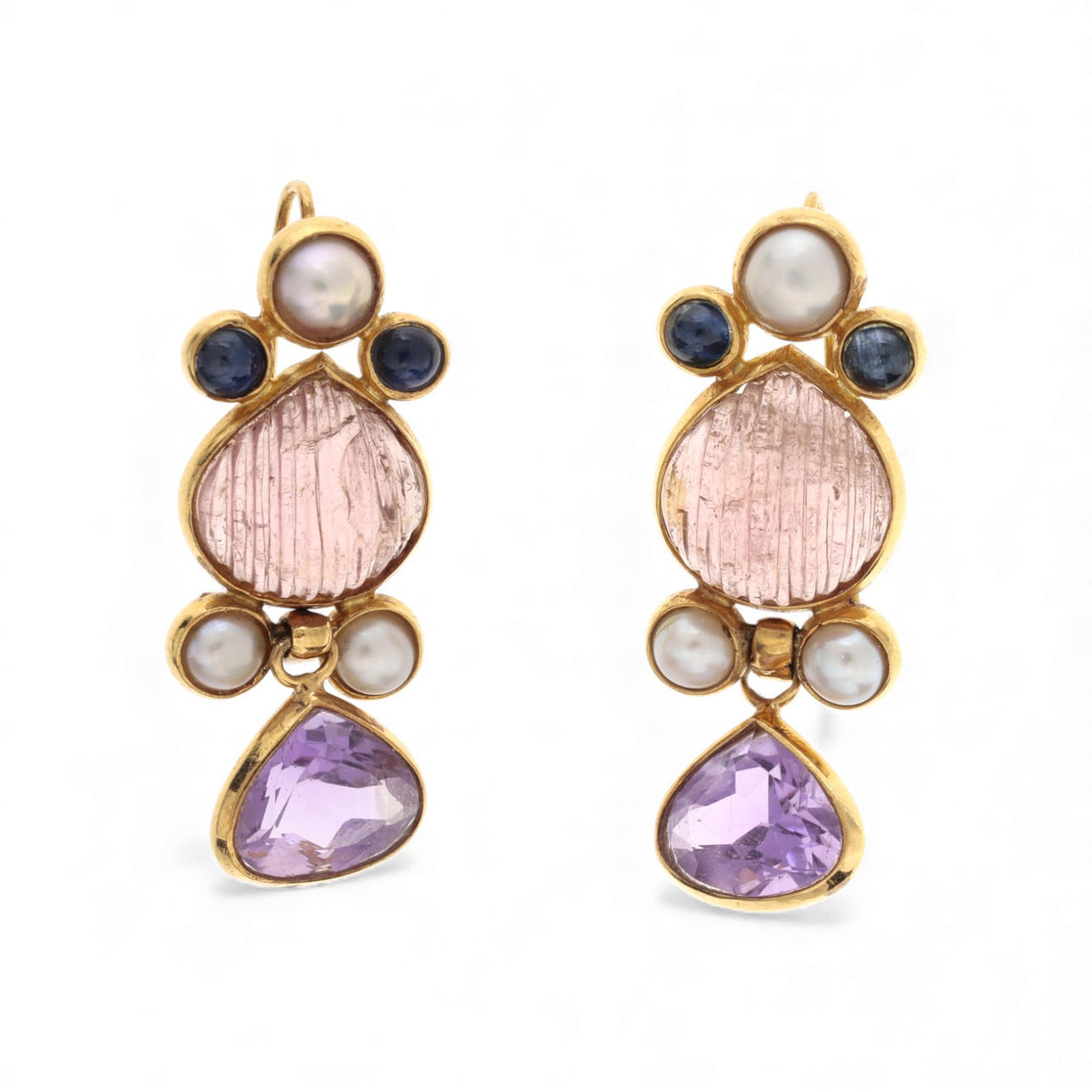 Gold and gemstones long earrings.