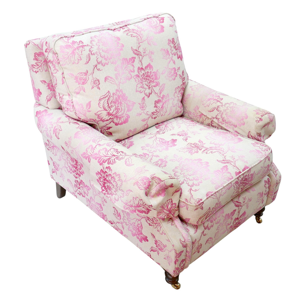 A 20TH CENTURY RECTANGULAR BACKED ARMCHAIR.