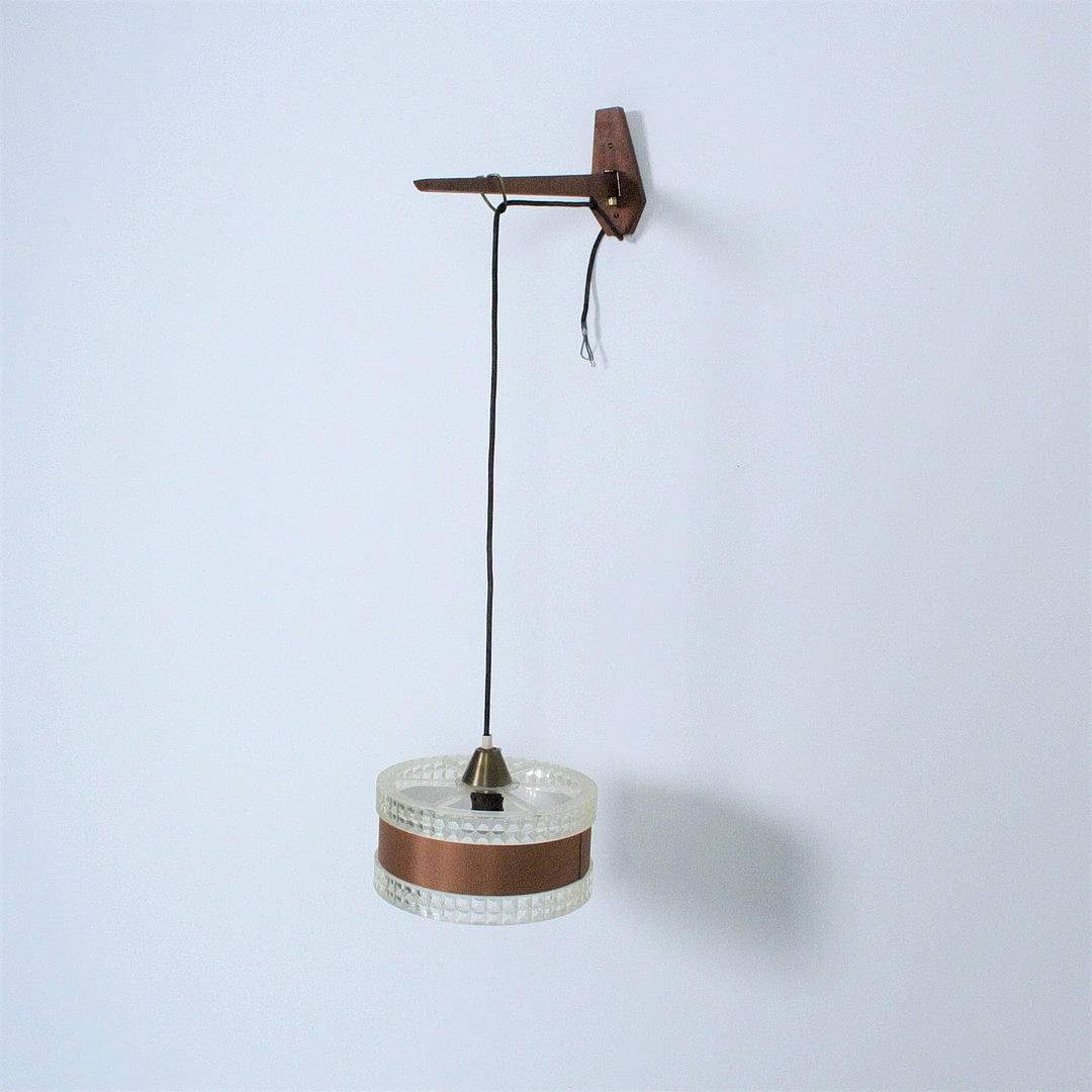 Wall lamps from the 1970s, teak, plastic.