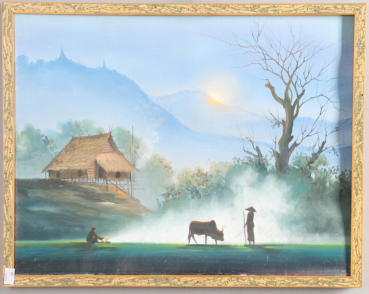 A FRAMED OIL OF AN EASTERN SCENE.