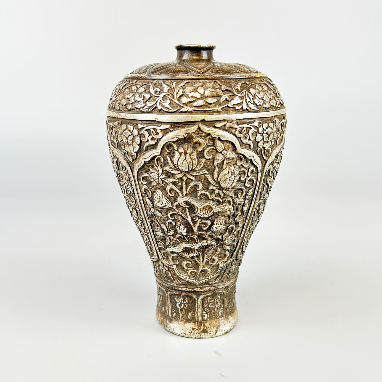 CHINESE WHITE METAL VASE.