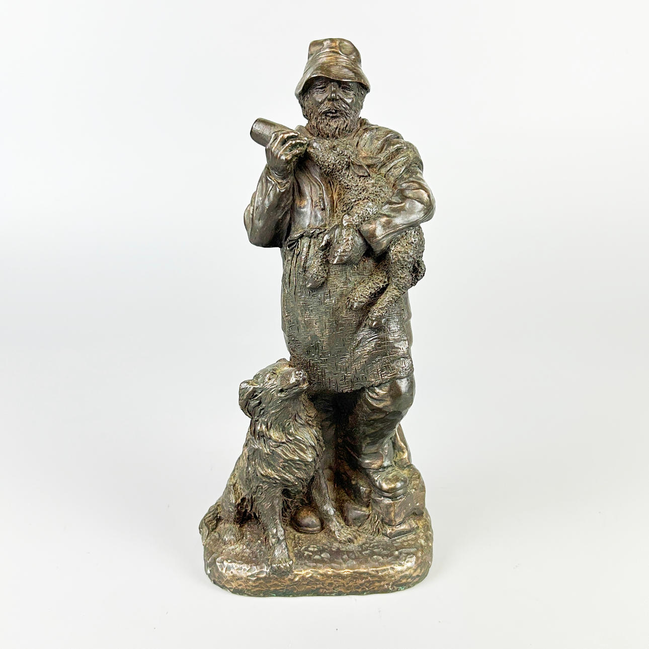 BRONZED METAL FARMER.