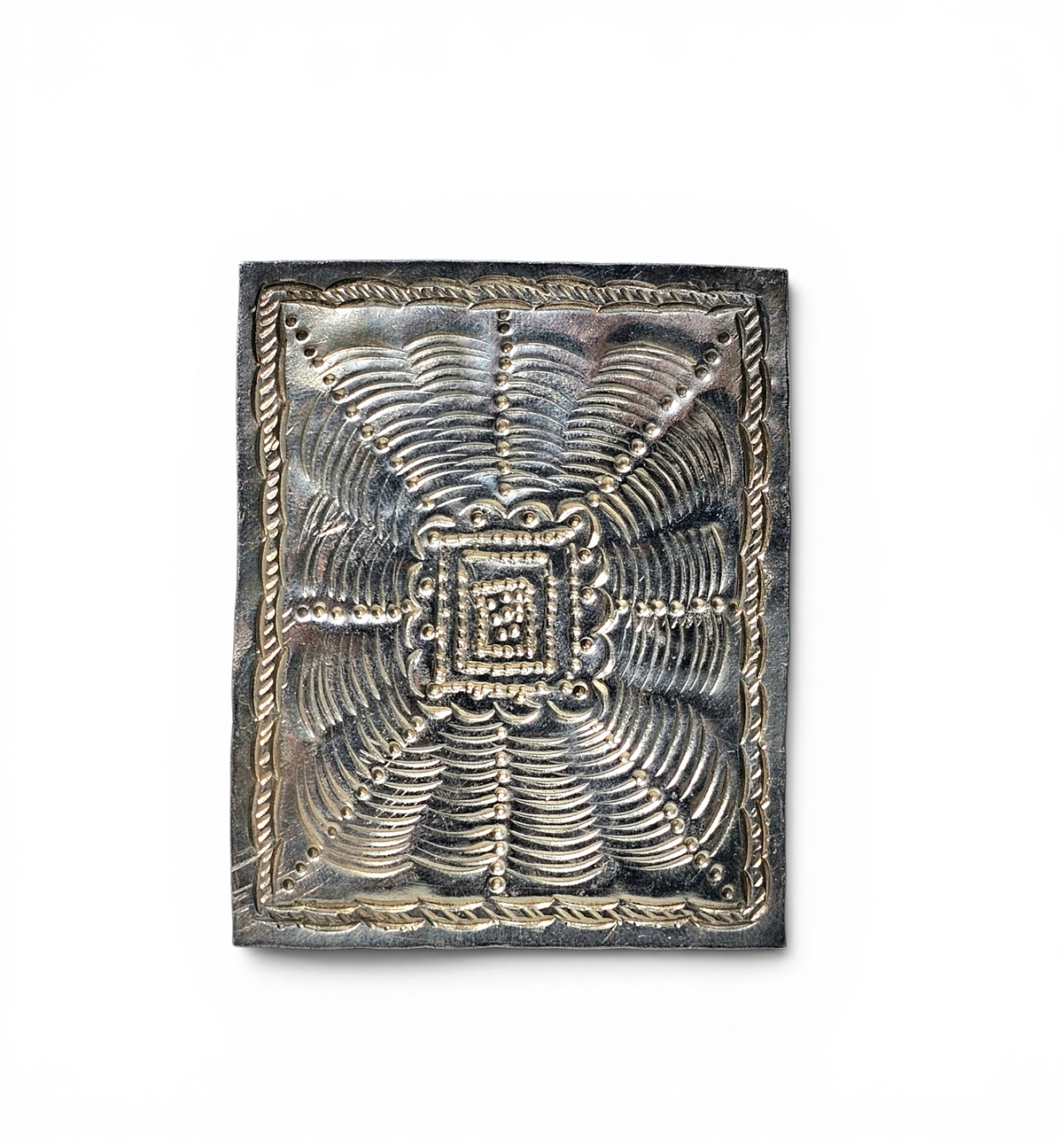 Tribal-style silver pendant in rectangular shape.