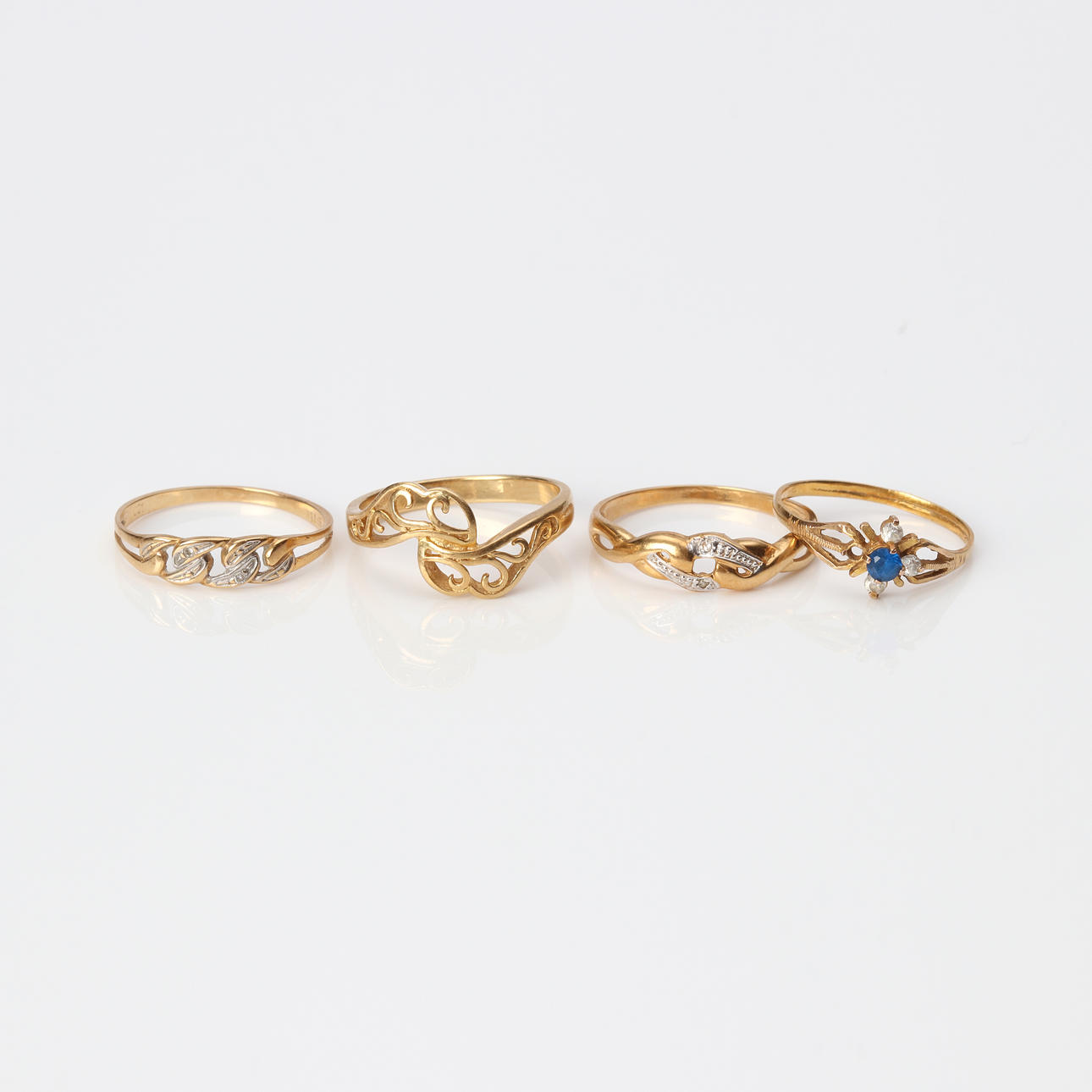 RINGS, FOUR 14k and 18k gold.