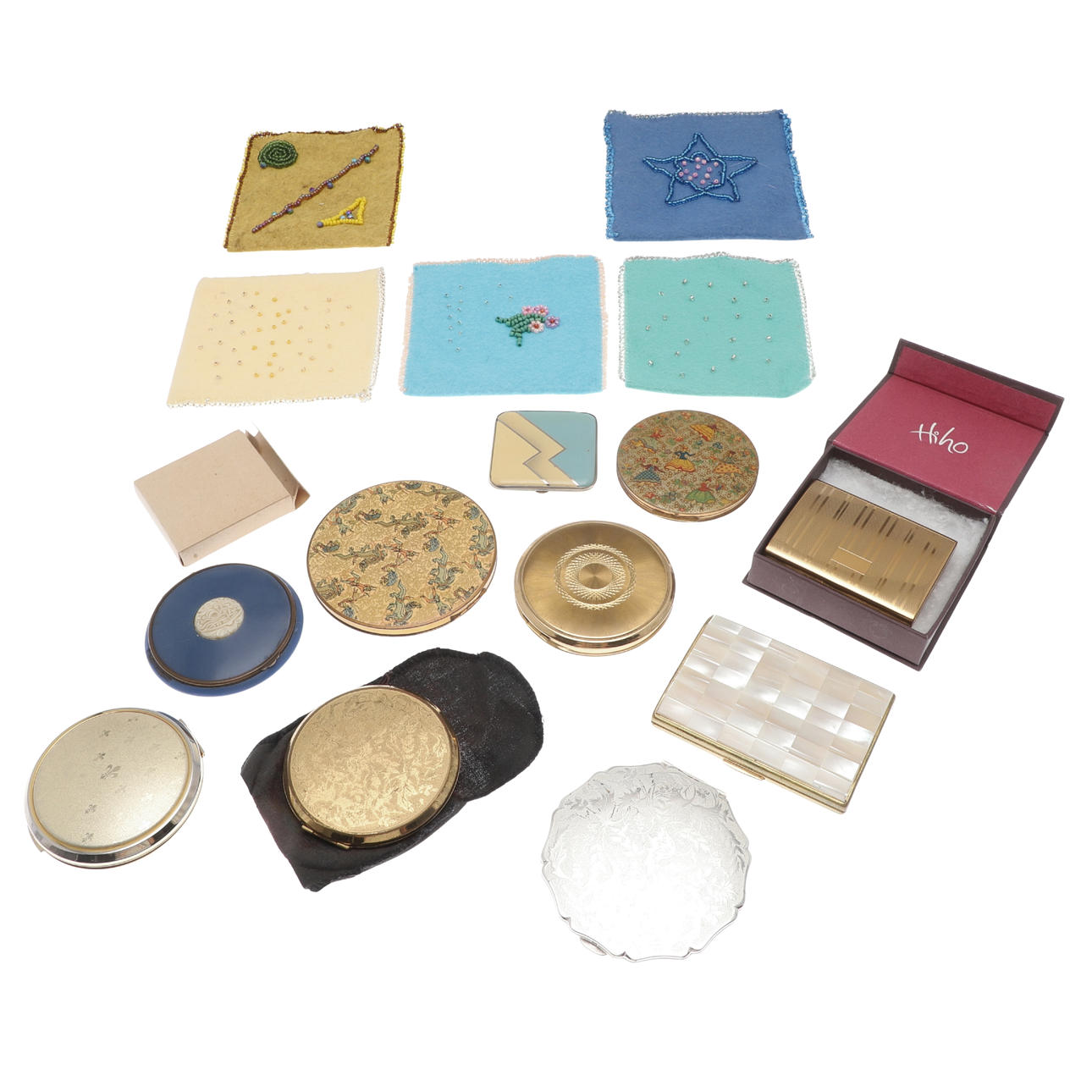 A QUANTITY OF COMPACT MIRRORS.