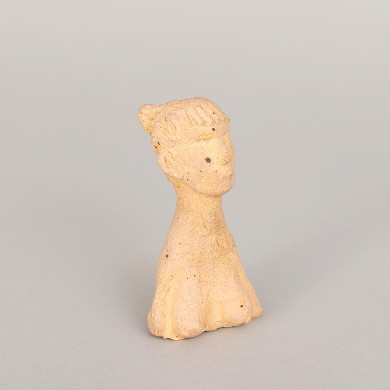 ÅKE HOLM. Face, terracotta, signed.