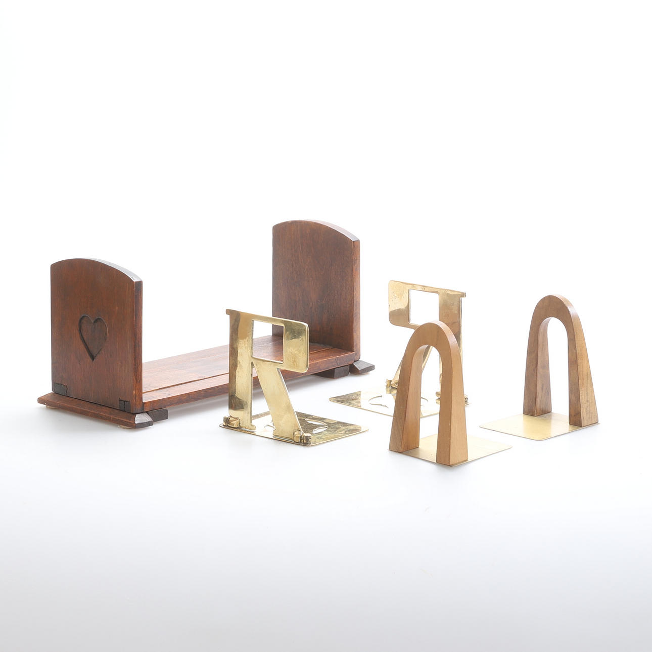 BOOKENDS, 3 pairs, wood, brass.