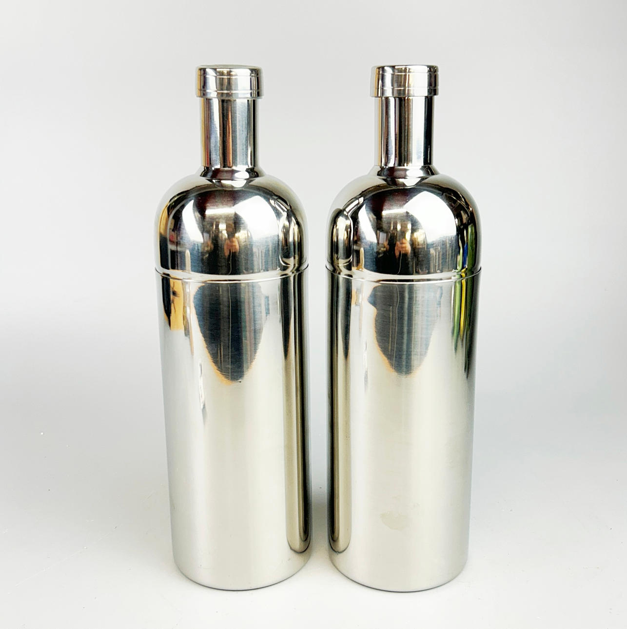 TWO COCKTAIL SHAKERS.