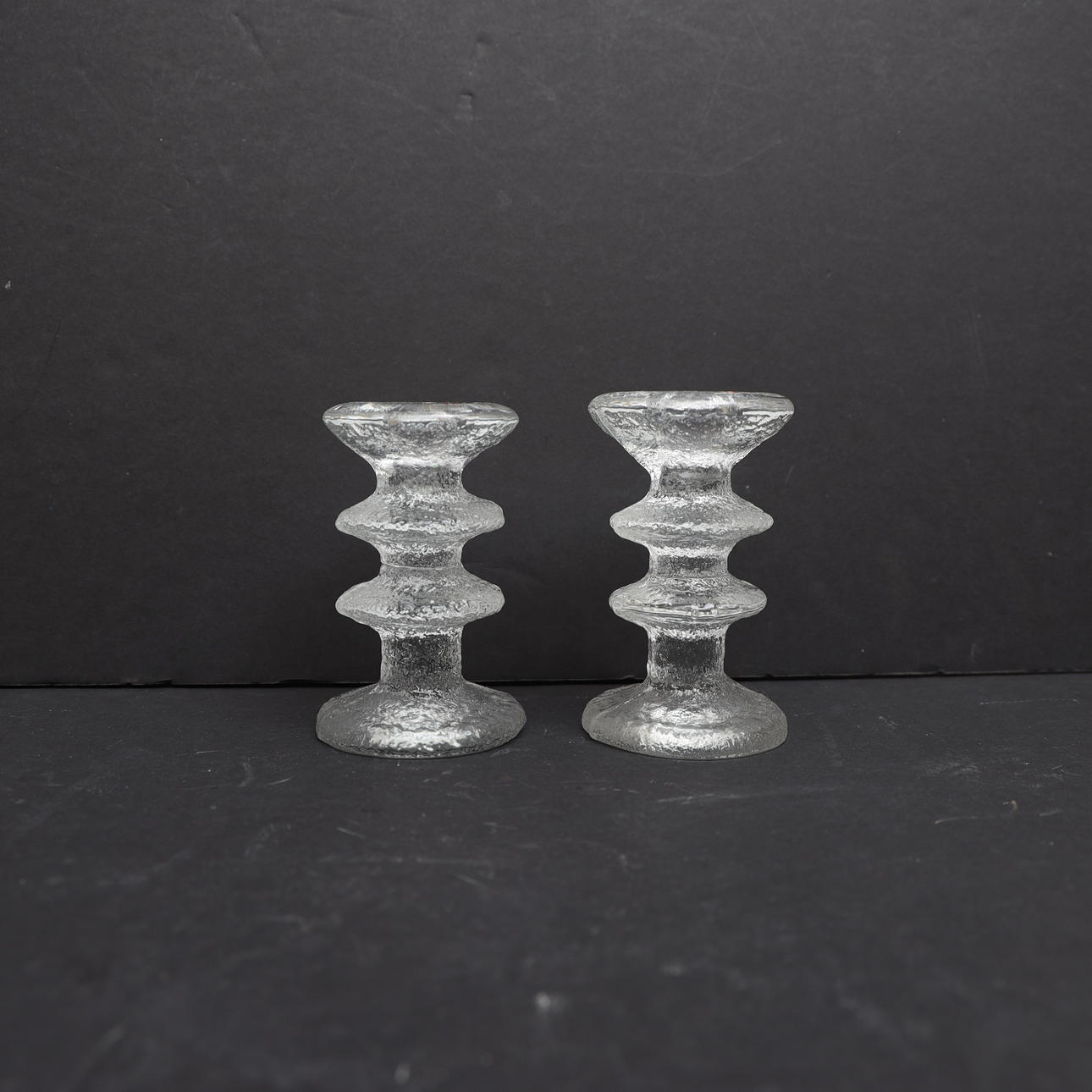 TIMO SARPANEVA. Candlesticks, a pair, "Festivo" Iittala, monogram signed.