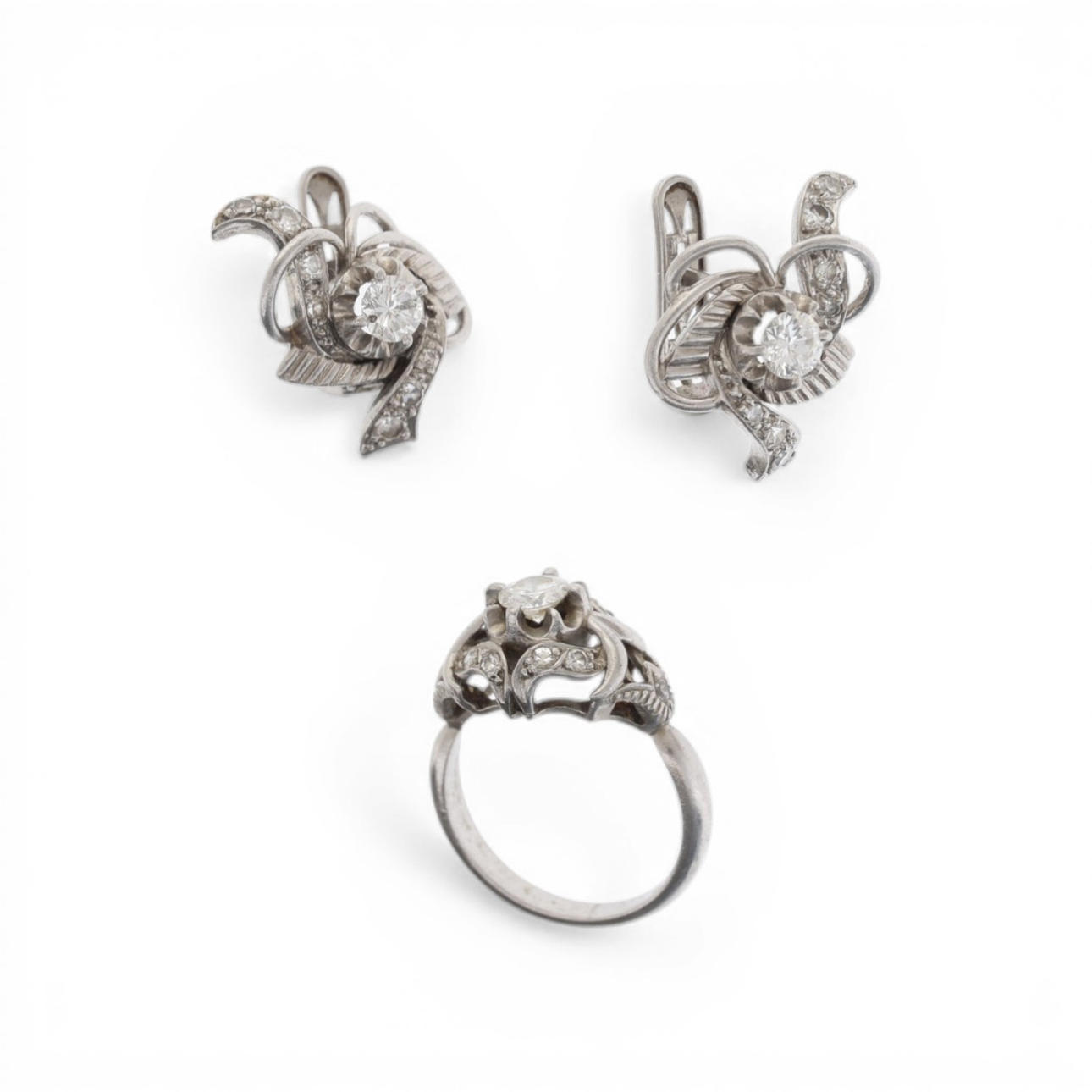 Diamonds ring and earring set, mid 20th Century.