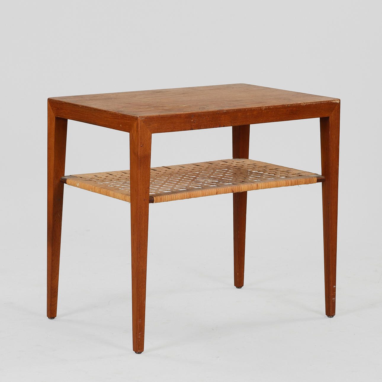 ERIK SEVERIN RISAGER-HANSEN. Side table / lamp table in teak and cane, Haslev Møbelfabrik, Denmark, 1950s-60s.