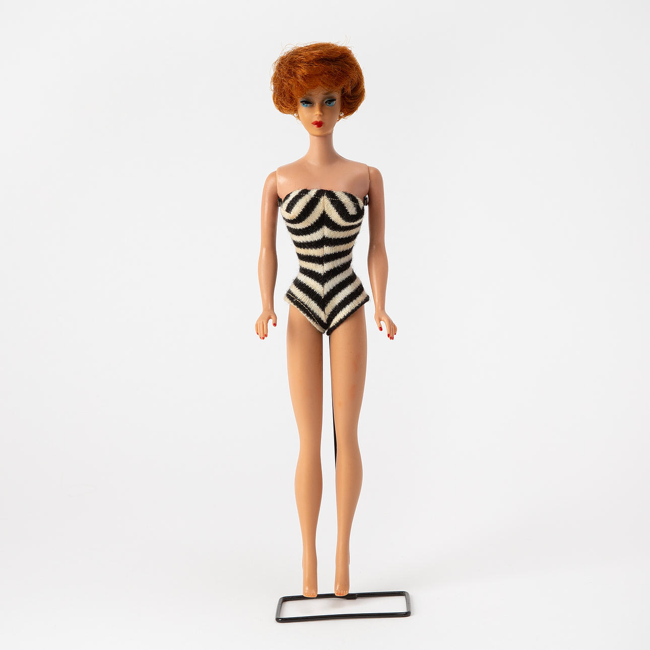 MATTEL INC. Barbie doll, 1960s.