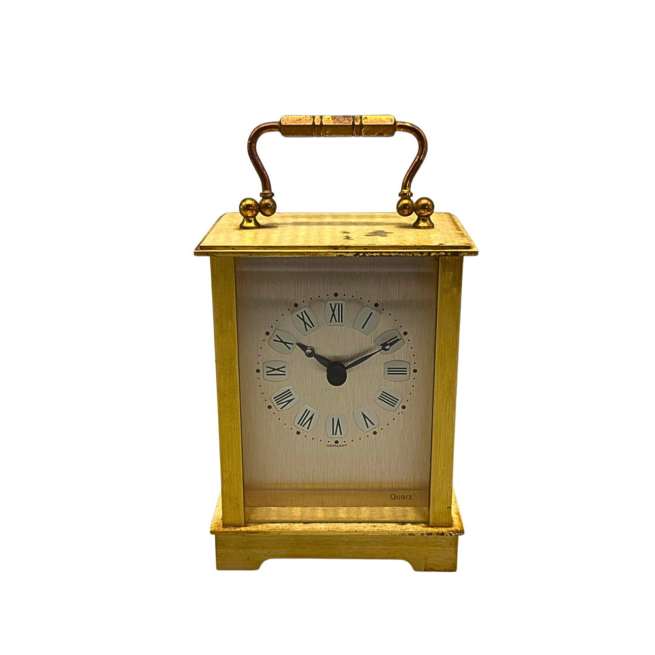 HANHART QUARTZ TABLE CLOCK WITH BRASS CASE AND CARRYING HANDLE.