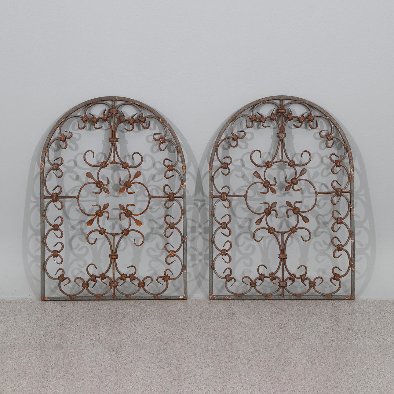 WINDOW GRILLES, A PAIR. Wrought iron.