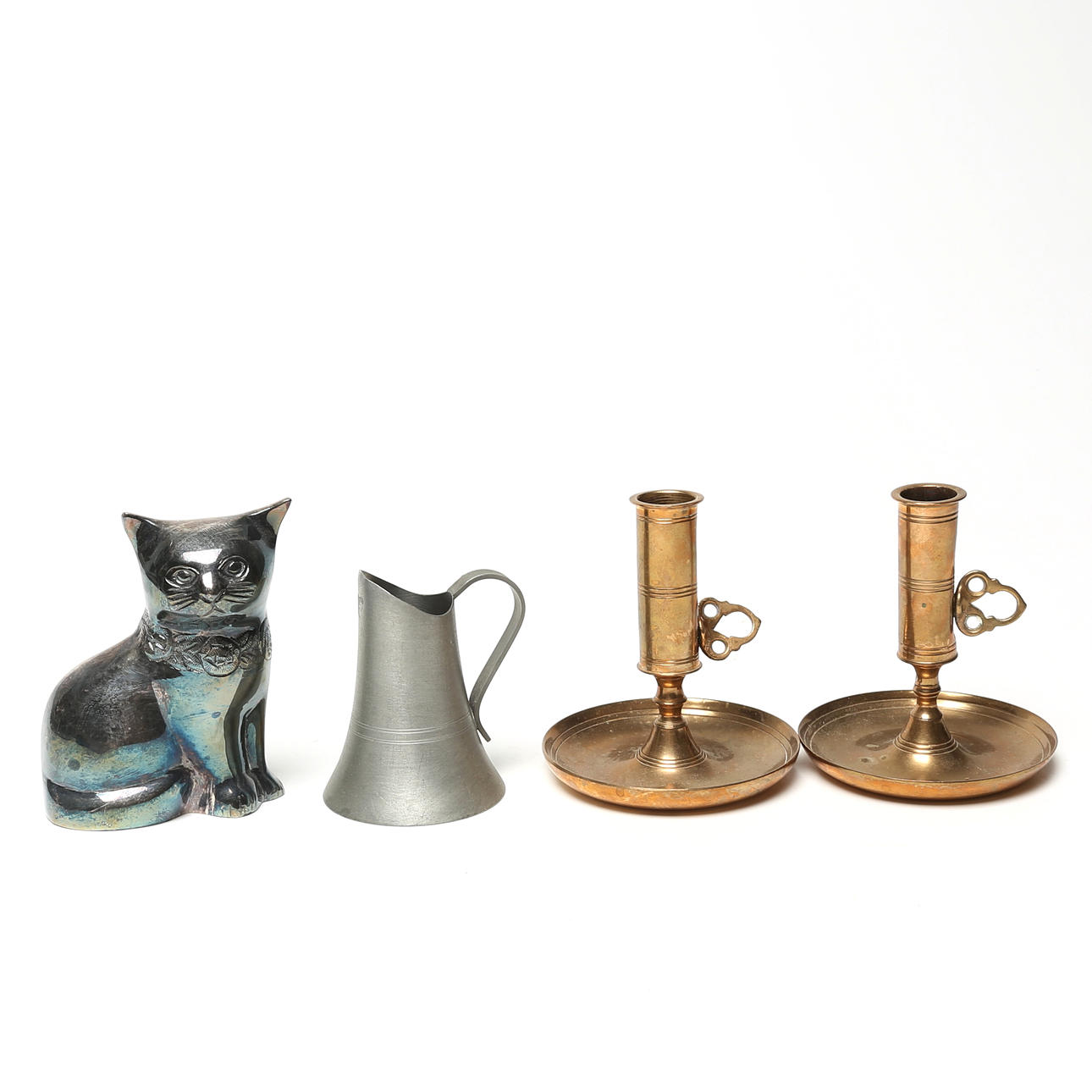 METAL OBJECTS 4 pcs, including office candlesticks.