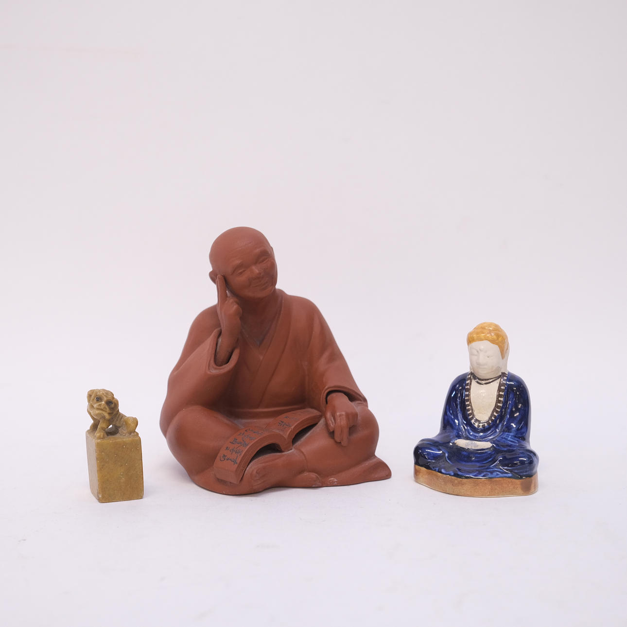 FIGURINES, THREE PIECES.