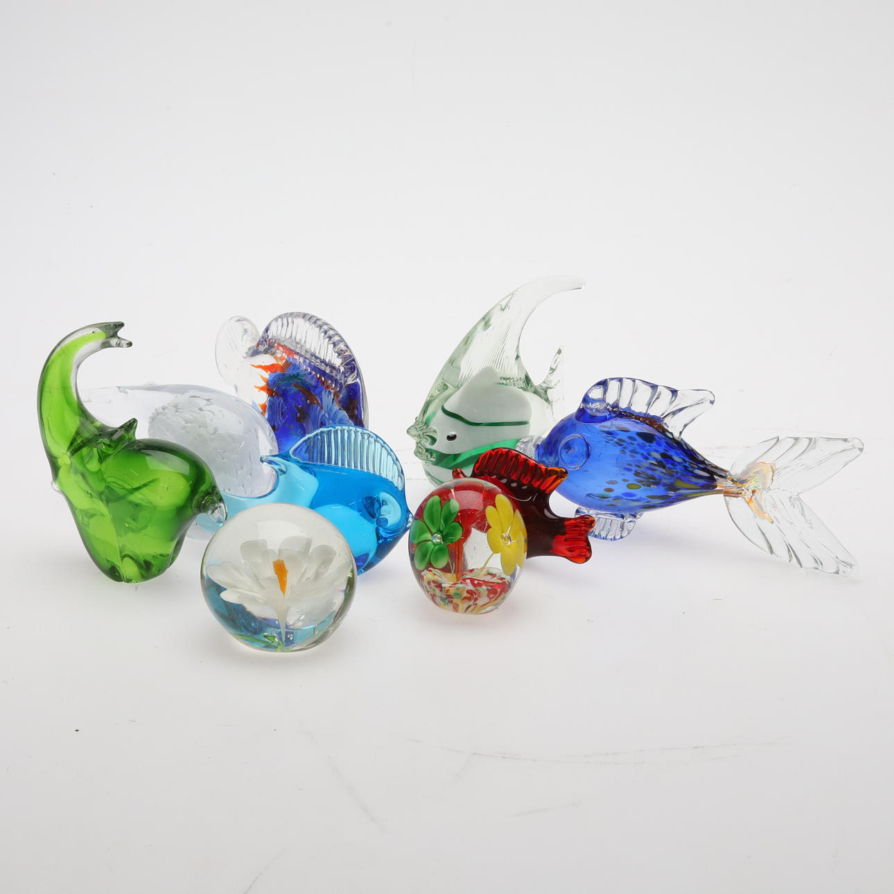FIGURINES. 9 pcs. Glass, 20th century.