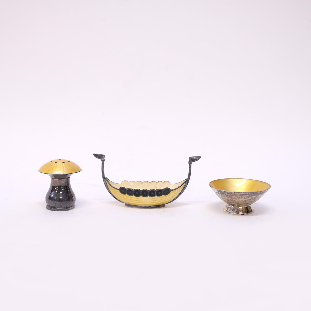 SALT CELLARS, THREE PIECES, SILVER WITH YELLOW ENAMEL.