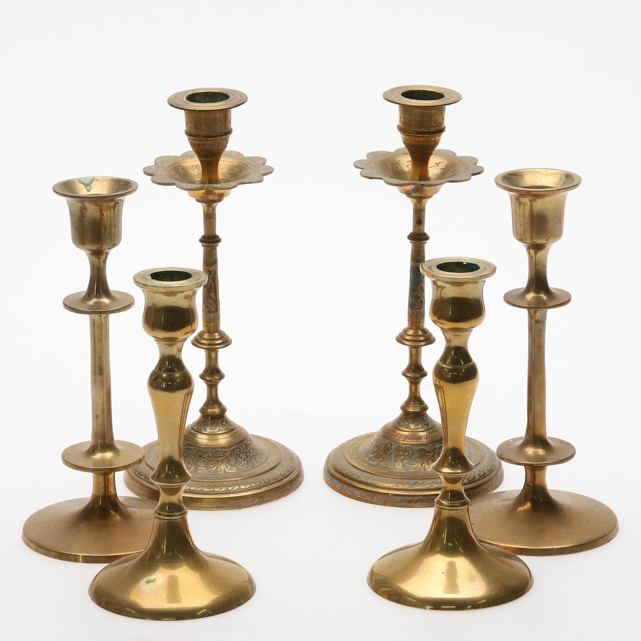 CANDLESTICKS. 3 pairs. Brass, 20th century.