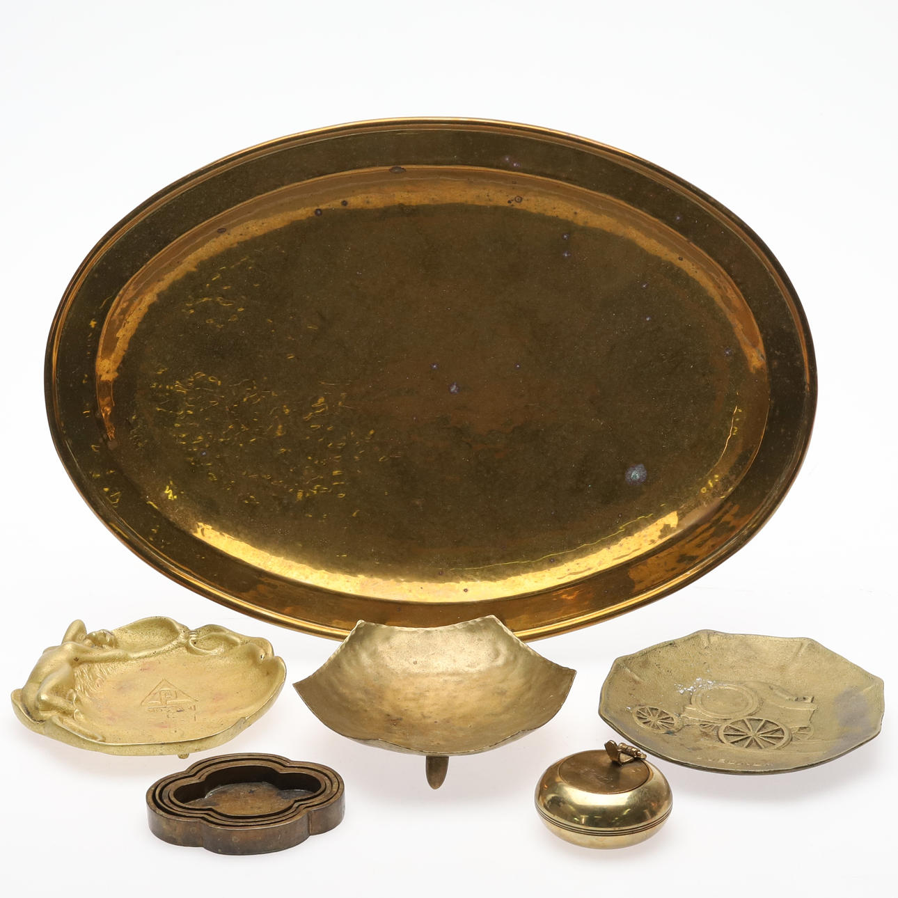 ASHTRAY / DISH. 9 pcs. Brass, 20th century.