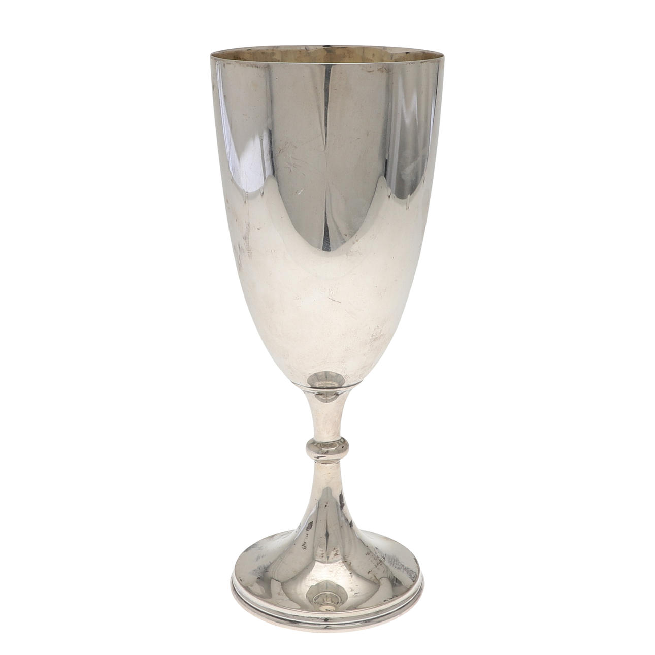 A LATE VICTORIAN SILVER CUP.