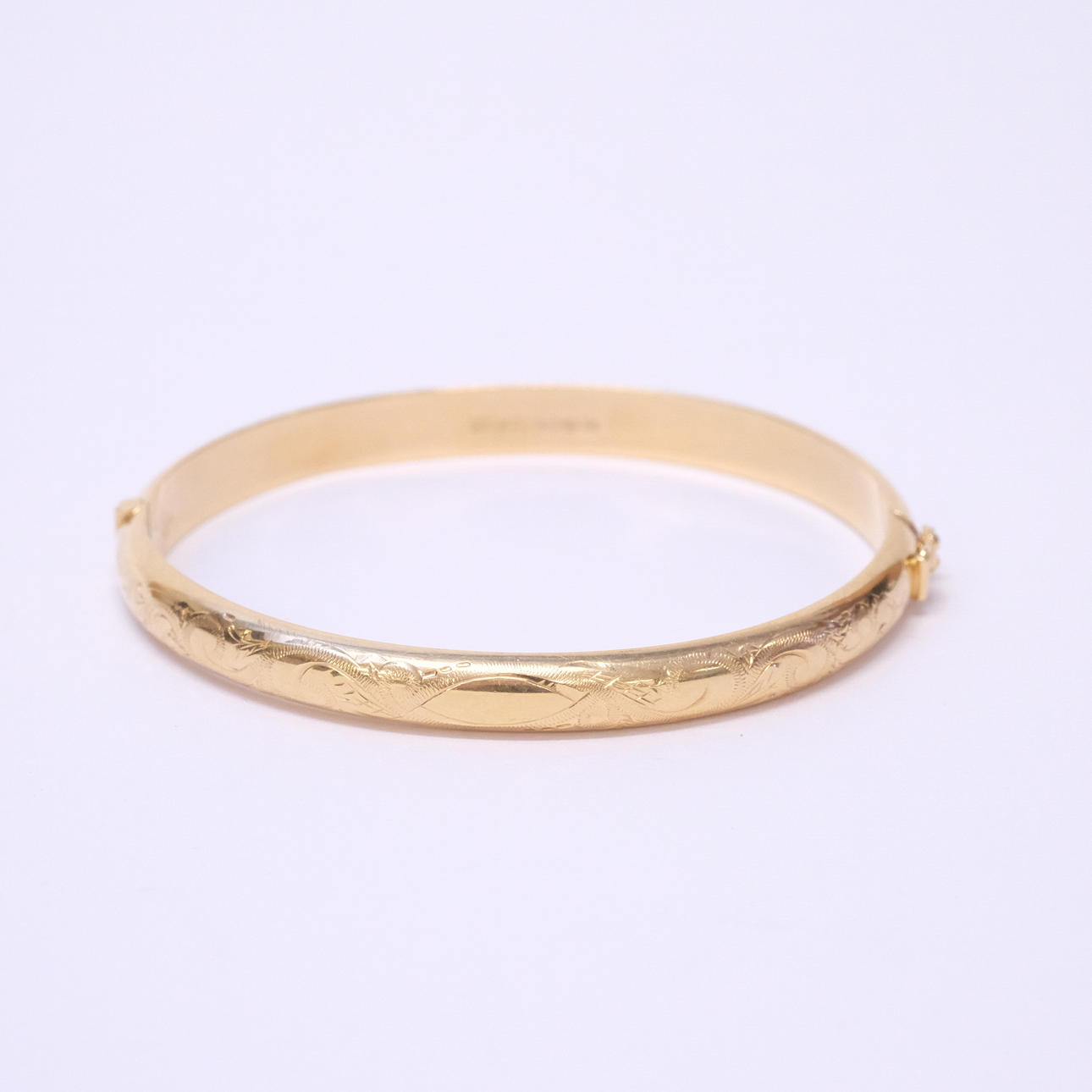 BANGLE, RIGID AND HINGED, 18K GOLD.