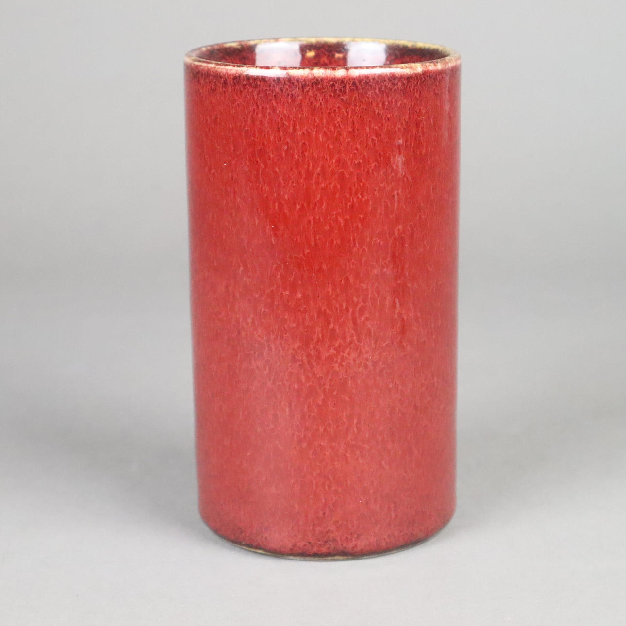 Brush pot - cylindrical shape with "oxblood glaze".