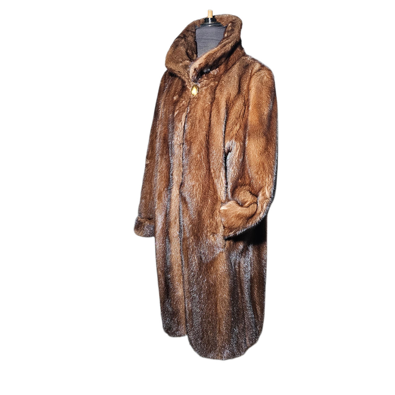 Long mink coat in brown. Size approx. 42.