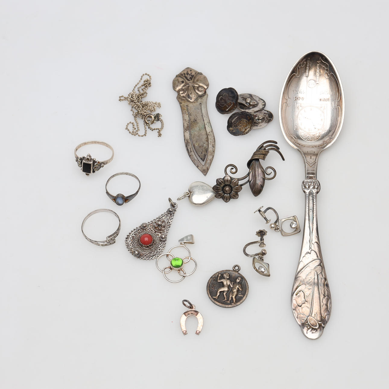 SILVER ITEMS 16 pieces gross weight approx. 63 grams.