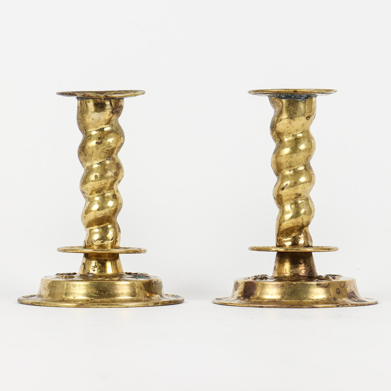 CANDLESTICKS, a pair, punched brass, 19th century.