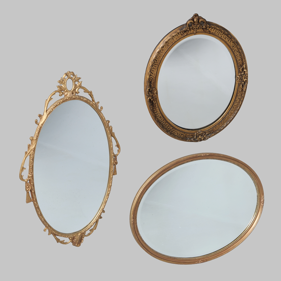 3 GILT OVAL MIRRORS.