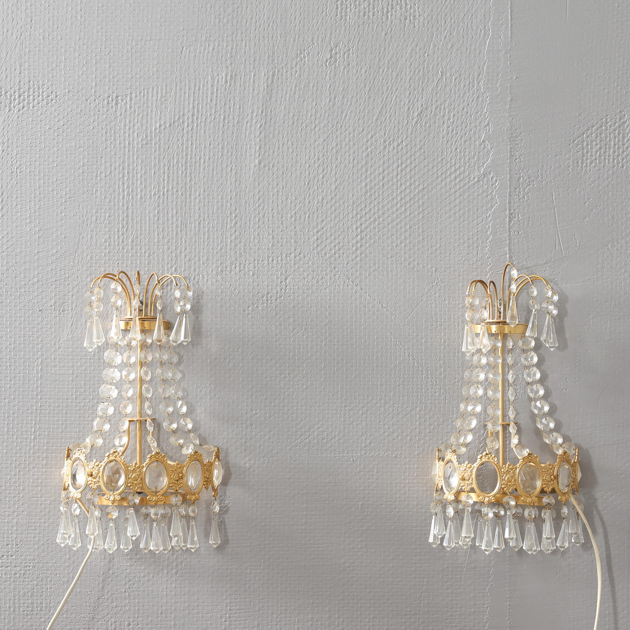 WALL SCONCE with prisms.