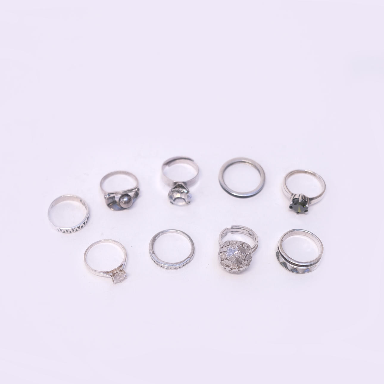RINGS, SILVER, NINE PIECES.