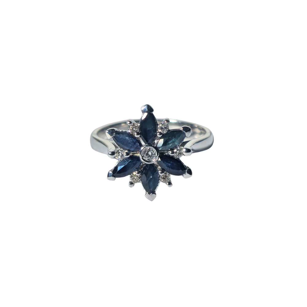Silver ring with sapphire and diamonds.